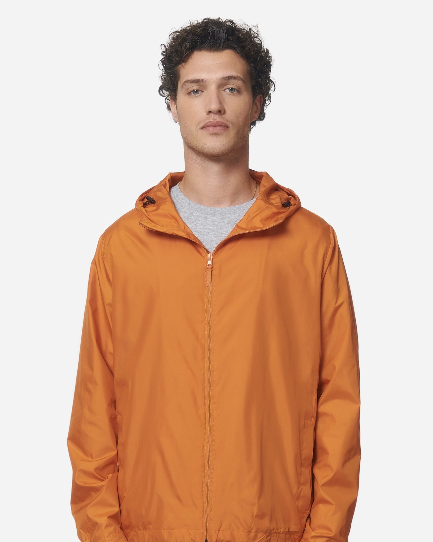Veste coupe-vent unisexe Commuter porté, coloris Flame Orange